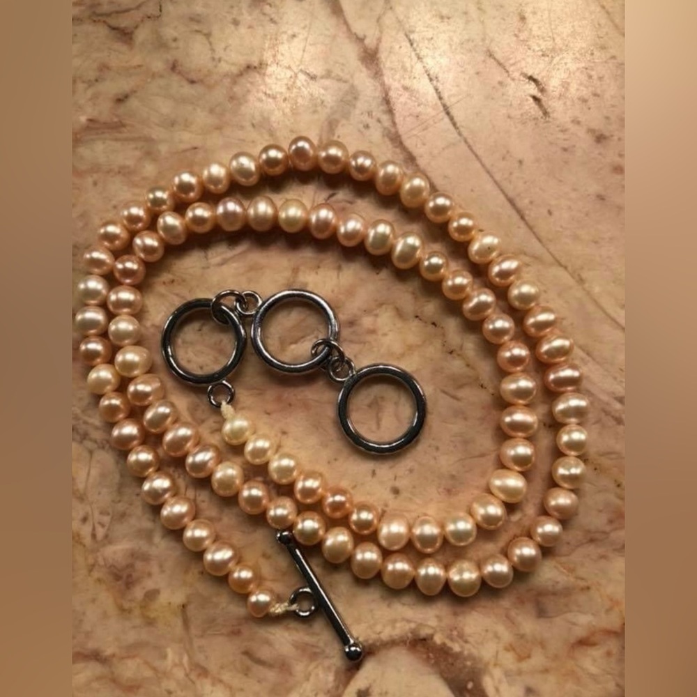 SaSpurilla Sterling peach pearl necklace
16-18”